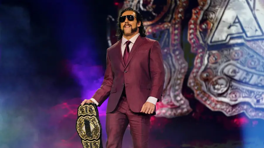 Kenny omega plum suit november 2021